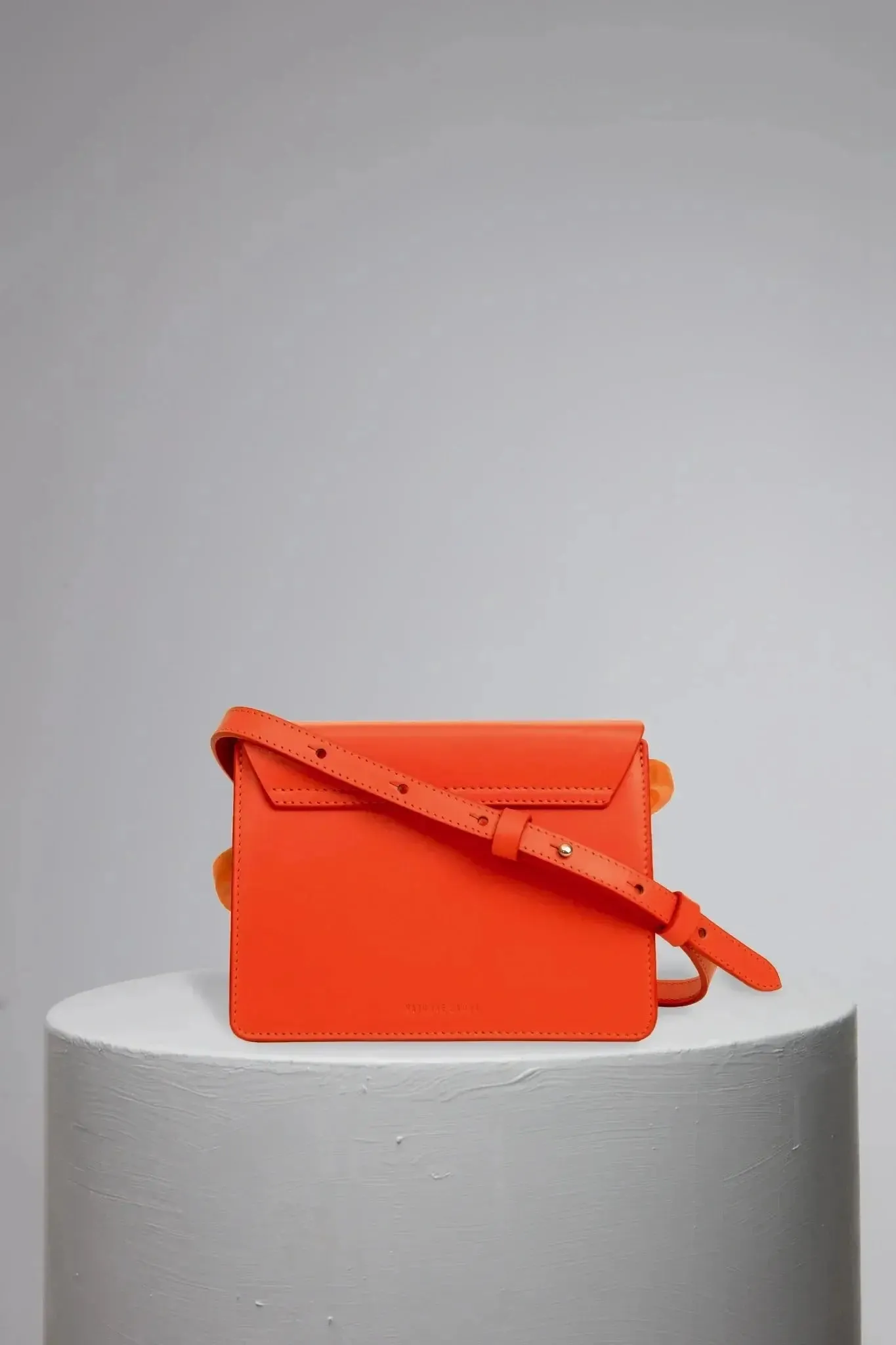 AIGES MINI | CORAL Leather Handbag by NATURAE SACRA