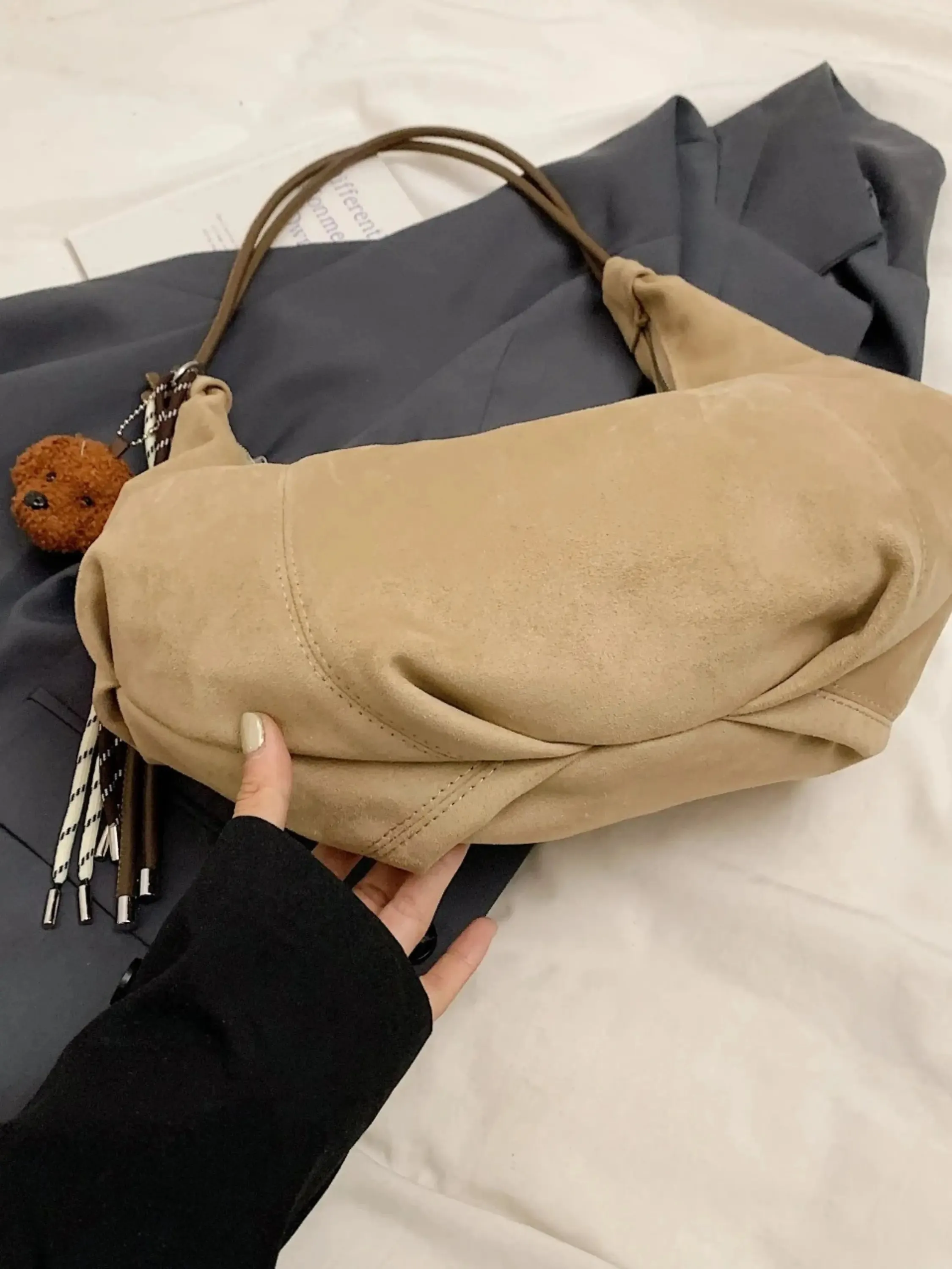Boho-Chic Hobo Bag with Playful Charm