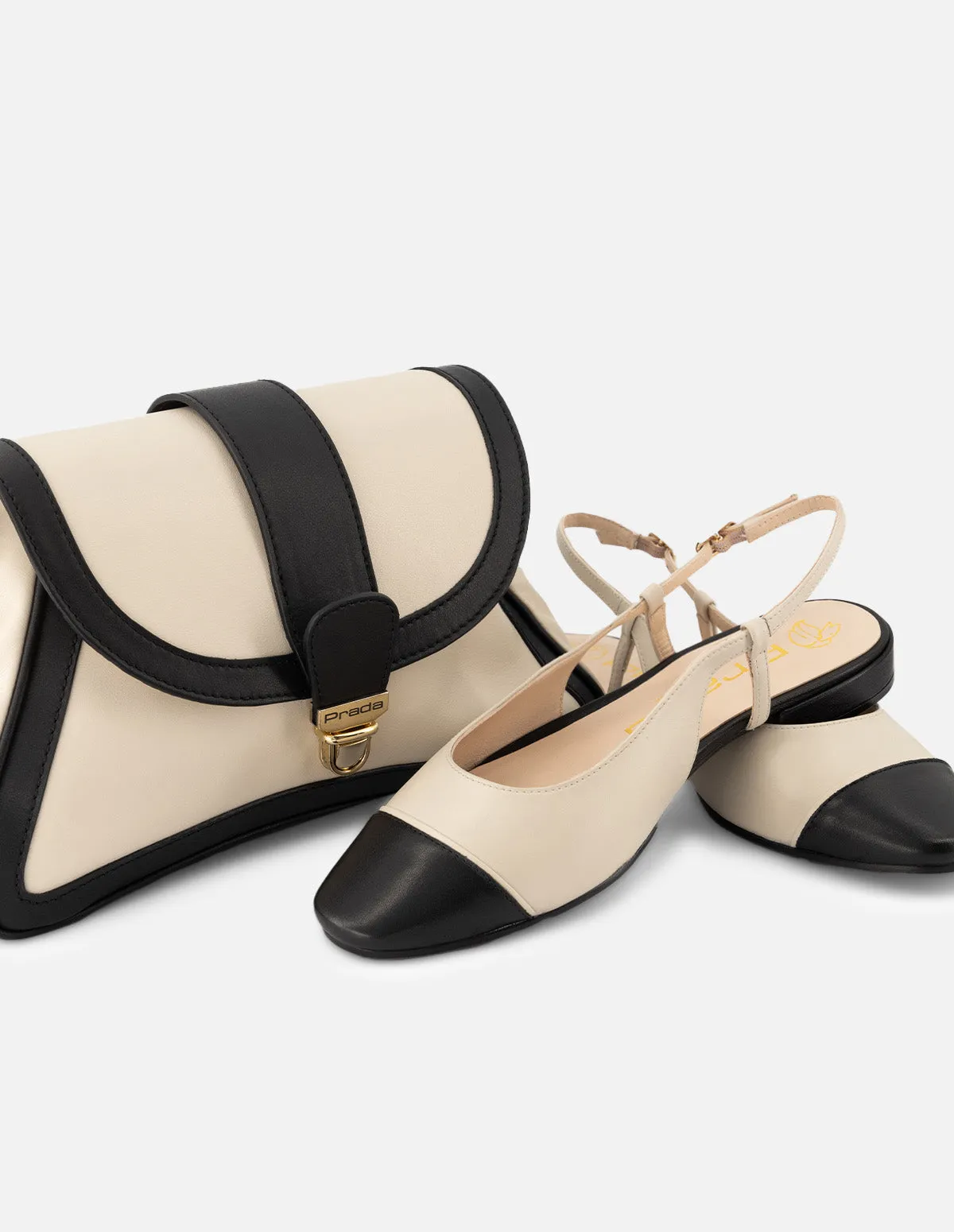 Bolso satchel de piel para mujer color blanco con contrastes color negro