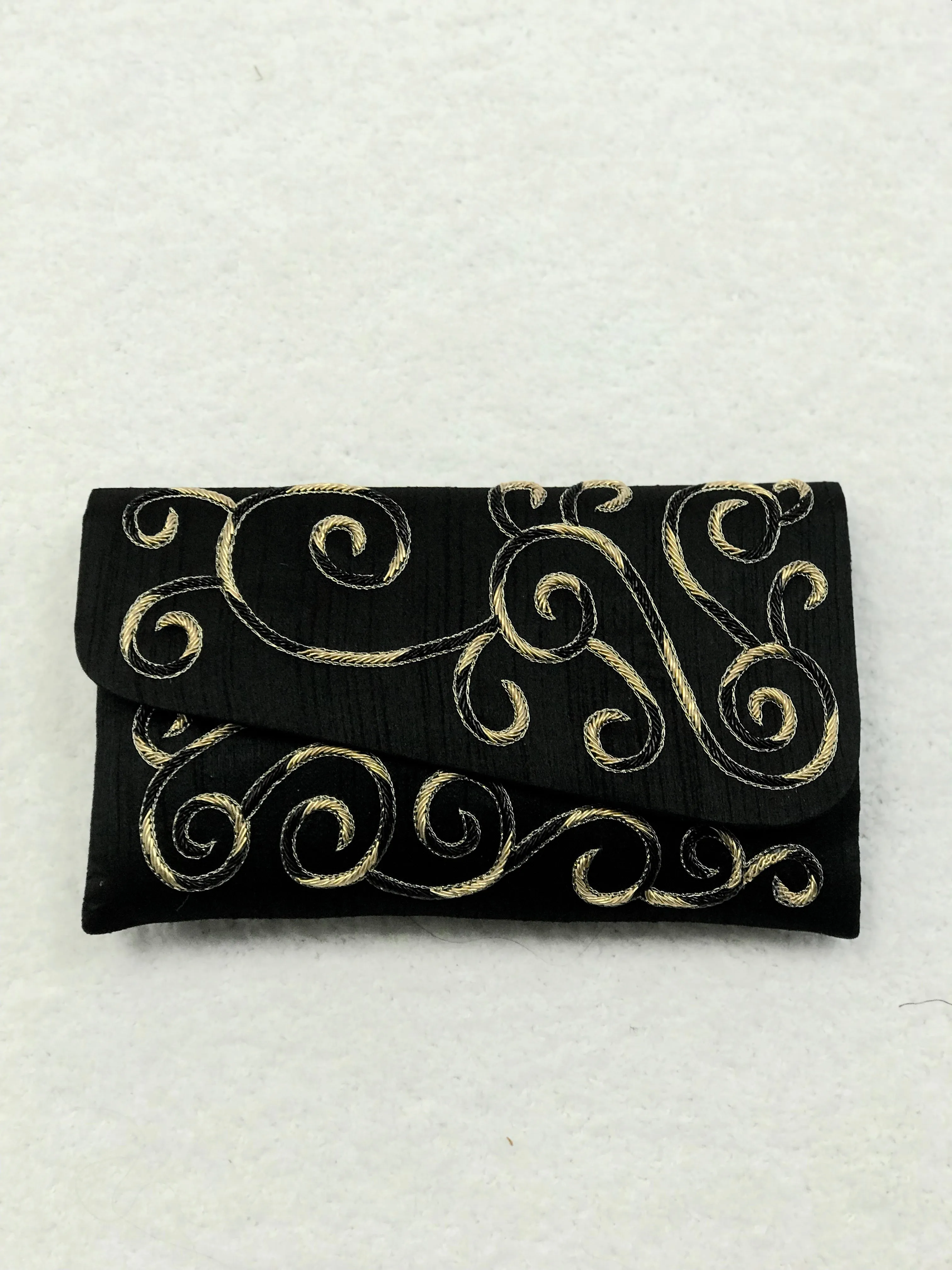 Embroidered clutch