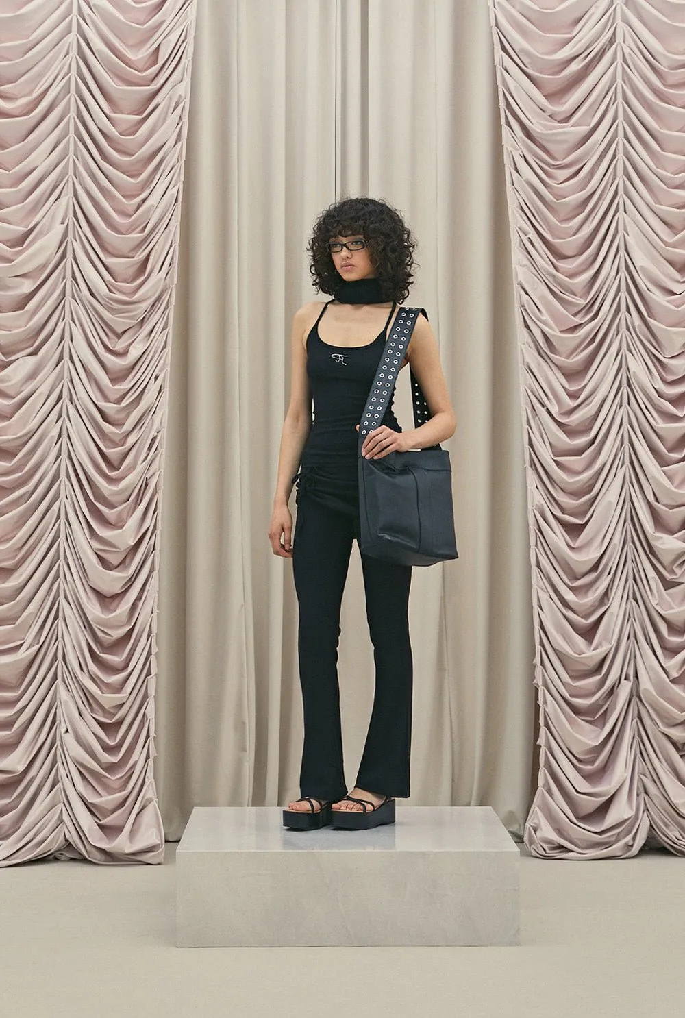 Eyelet bucket bag