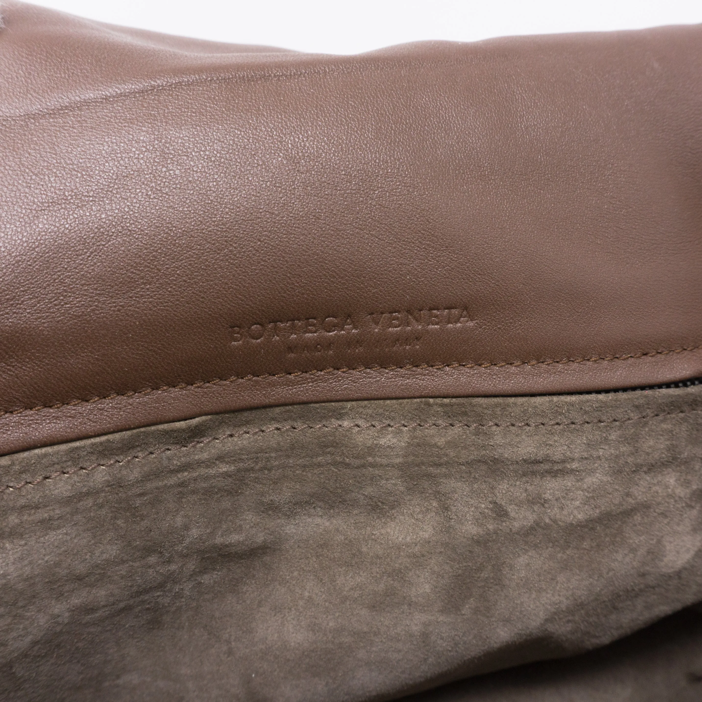 Intrecciato Drawstring Flap Crossbody Bag