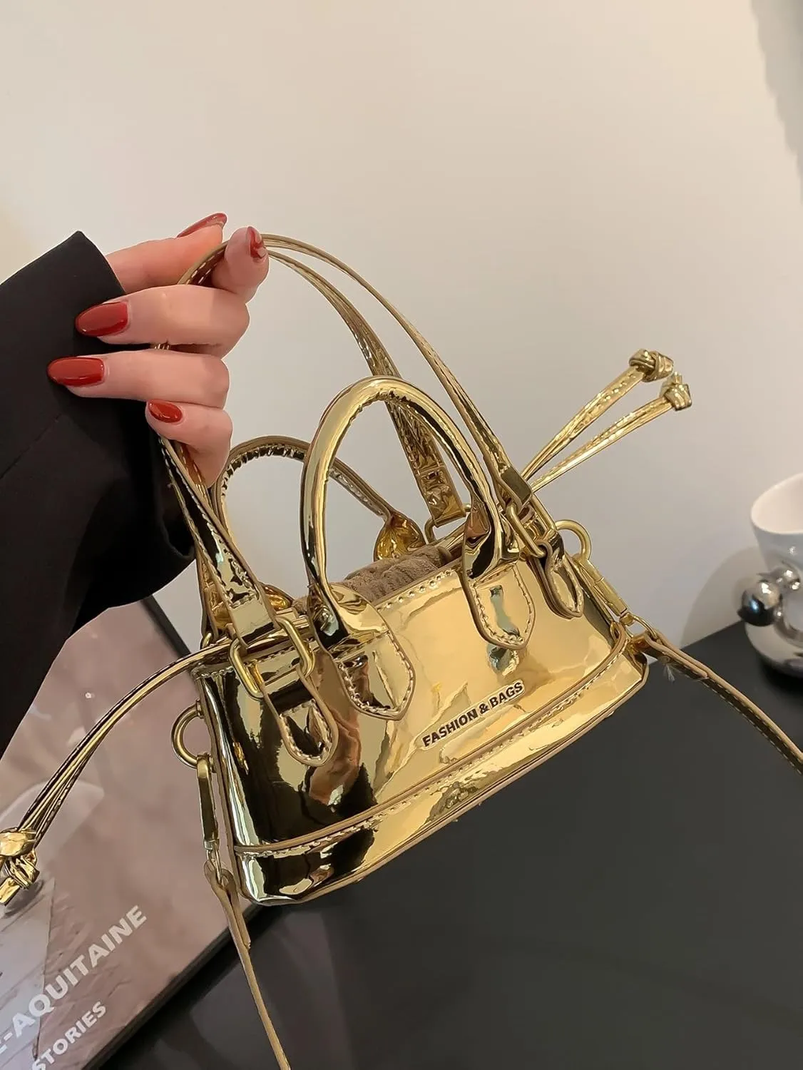 OYOANGLE Women's Metallic Letter Print Drawstring Bucket Bag Double Handle Crossbody Shoulder Handbags