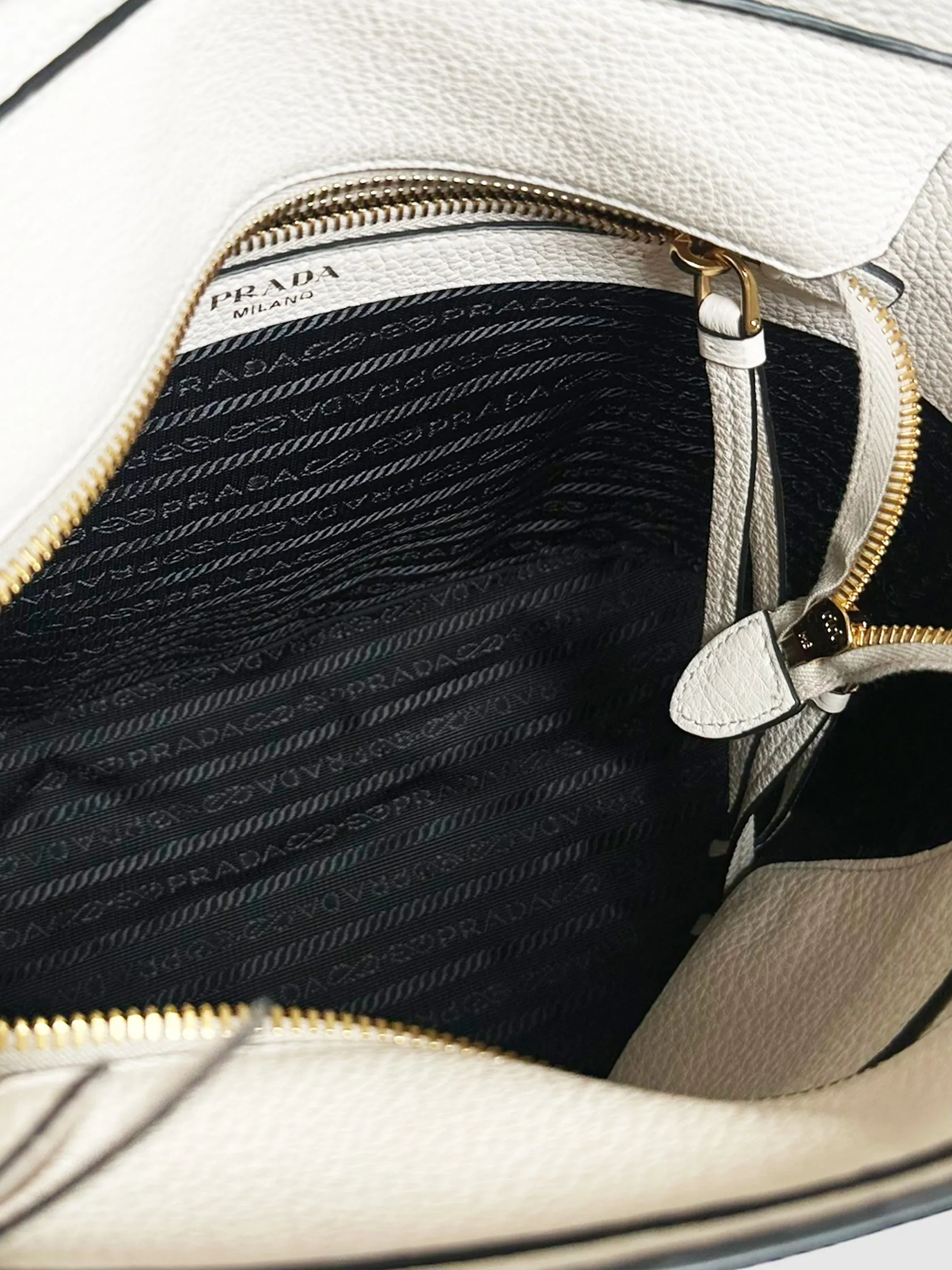 Prada Logo-Embossed Vitello Phenix Bucket Bag
