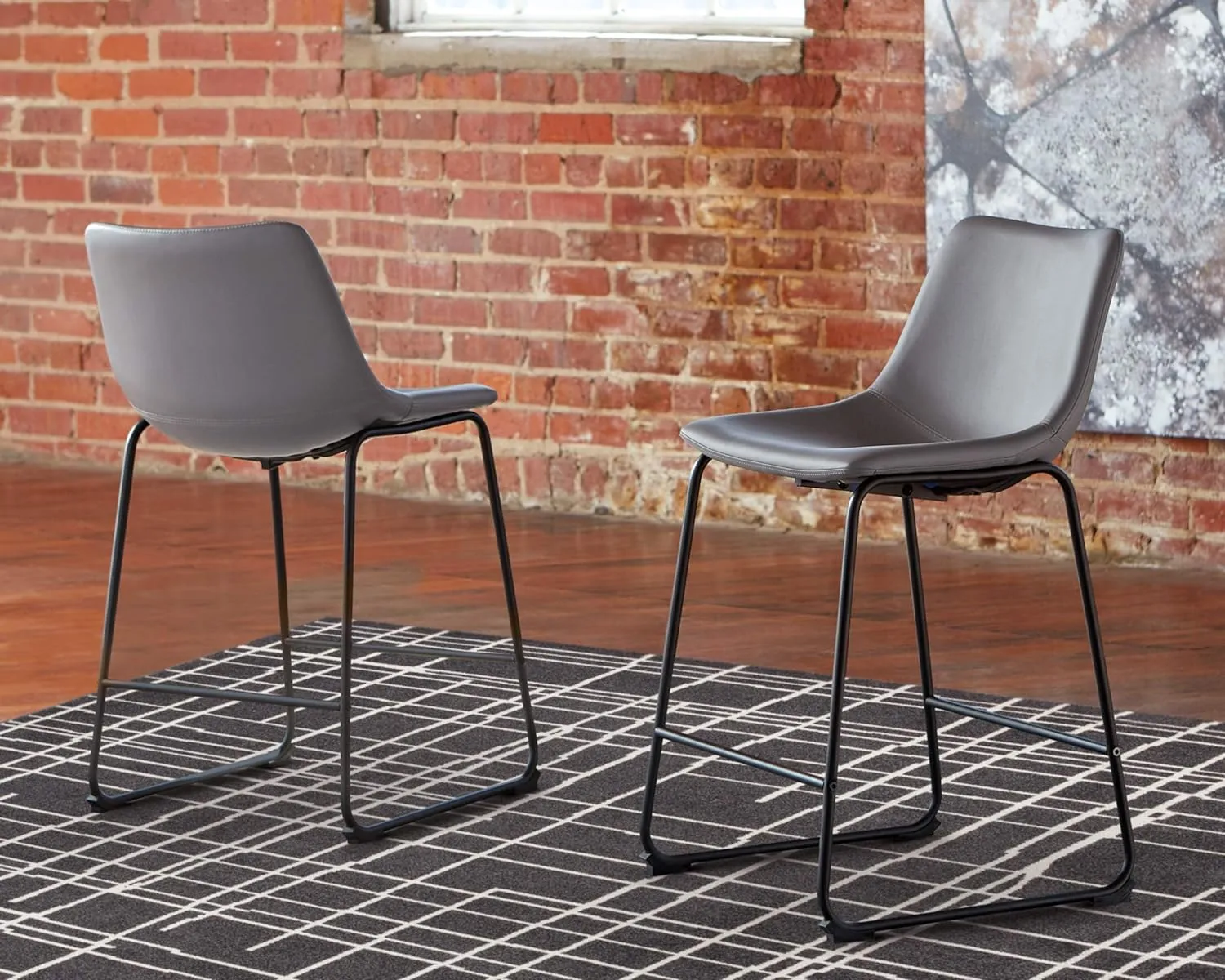 Signature Design by Ashley Centiar Modern Faux Leather 23.75" Counter Height Bucket Seat Barstool, Set of 2, Gray