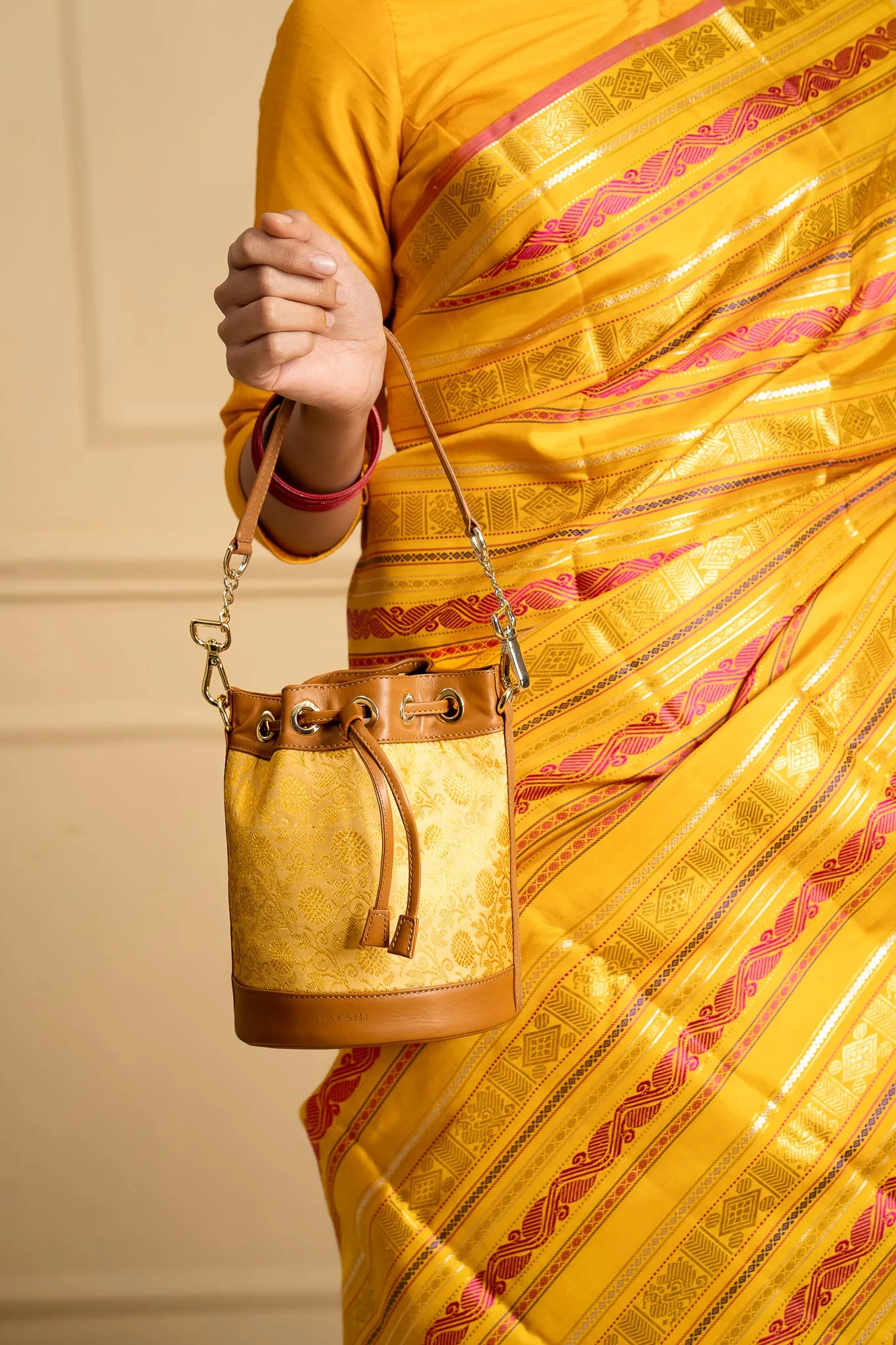 Yanay Kanchi Brocade Potli Gold & Tan